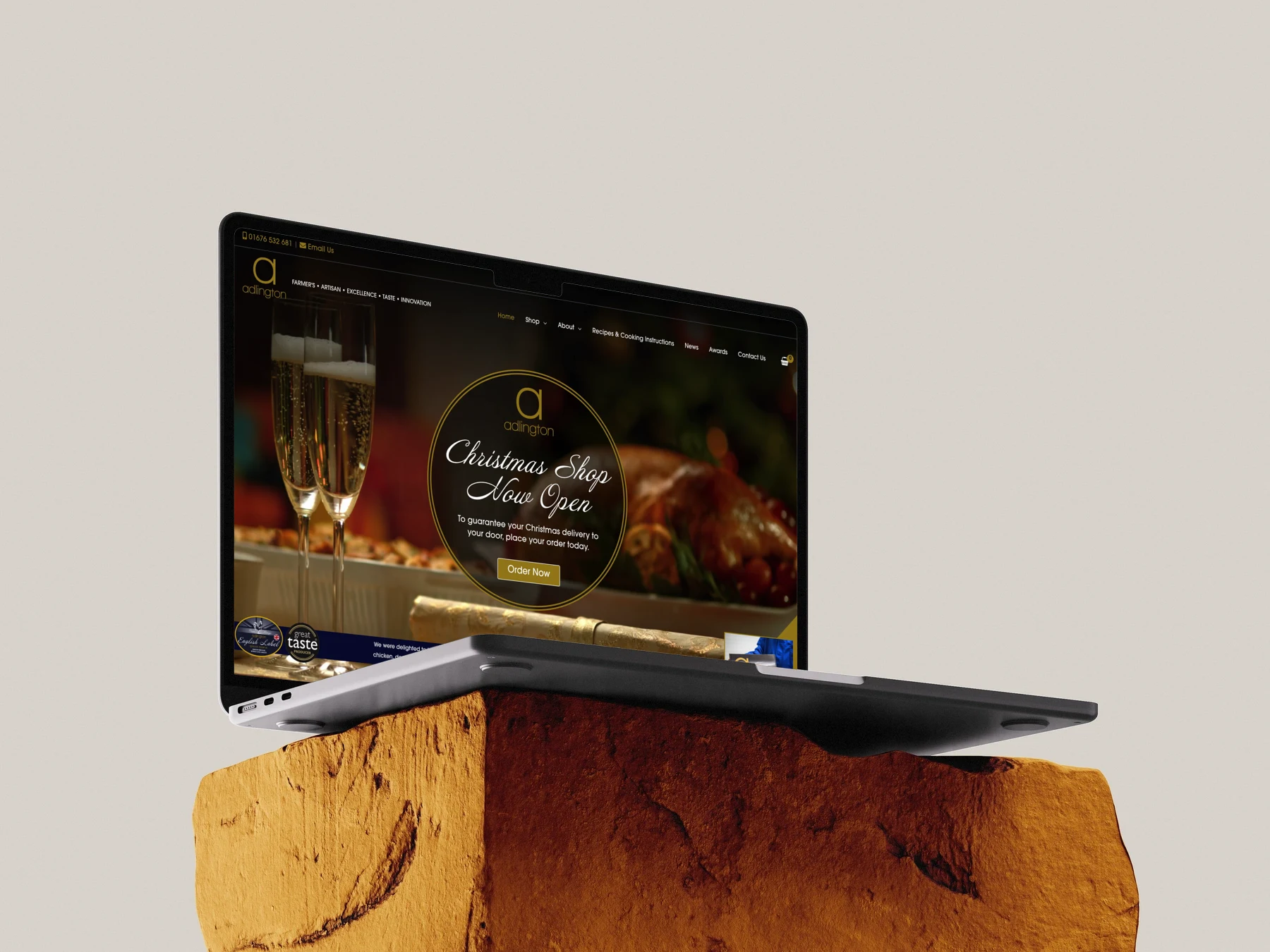 Adlington — MacBook on golden stone