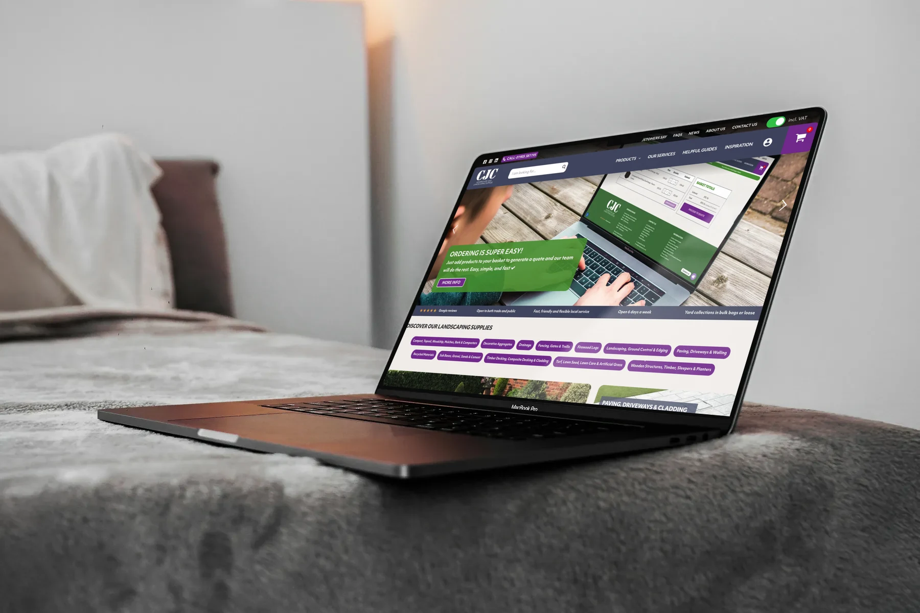 CJC Aggregates — MacBook on bed